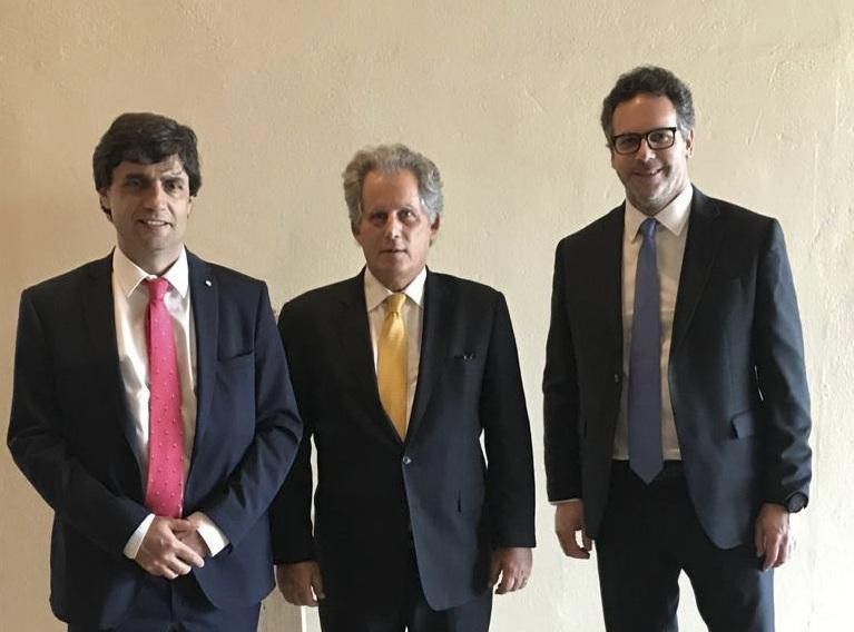 Hernán Lacunza y Guido Sandleris con David Lipton, AGENCIA NA