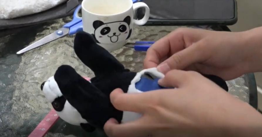 Oso panda de peluche