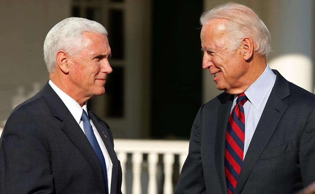 Mike Pence y Joe Biden, Estados Unidos, REUTERS