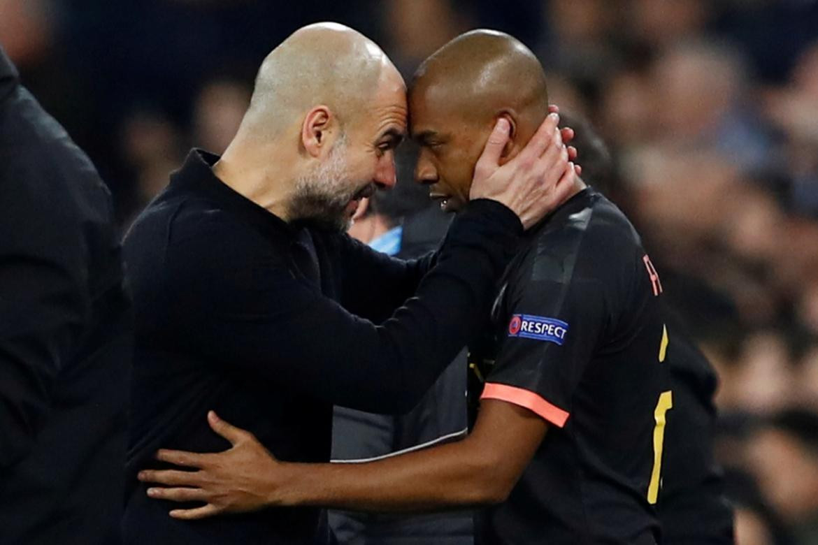 Pep Guardiola y Ferdandinho, Reuters