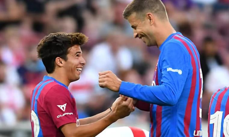 Riqui Puig y Gerard Piqué. Foto: NA.