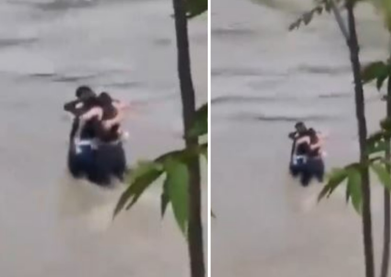 El desgarrador abrazo de tres amigos en las inundaciones de Italia. Foto: captura de video.