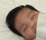 Dormir a un bebé en un minuto