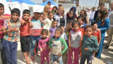 Malcorra junto a refugiados sirios