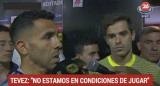 Carlos Tevez y Fernando Gago, en el vestuario del Monumental tras los incidentes (Canal 26)