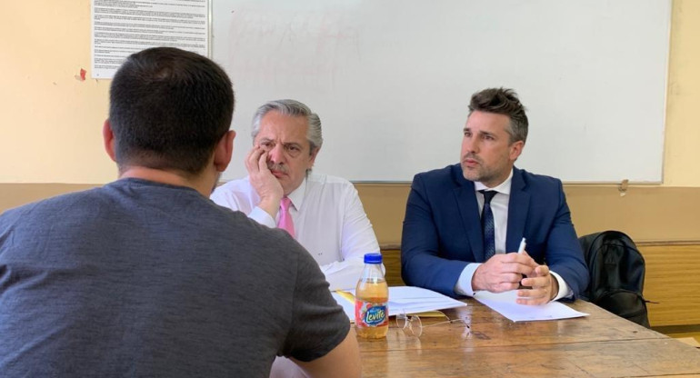 Alberto Fernández tomando examen en la Facultad de Derecho