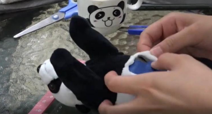 Oso panda de peluche