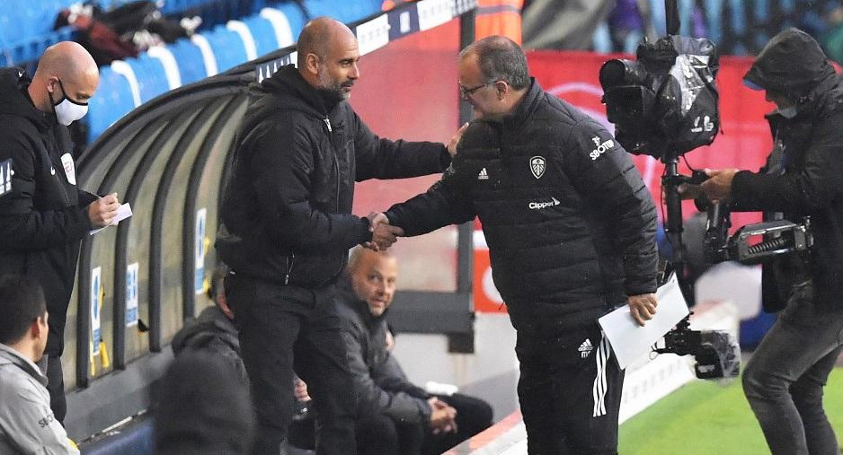 Pep Guardiola y Marcelo Bielsa, Reuters