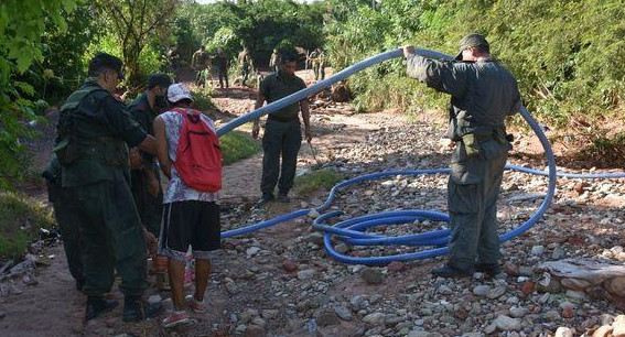 Traficaban aceite comestible a Bolivia a través de una manguera por la frontera, Fotos de Gendarmería Nacional