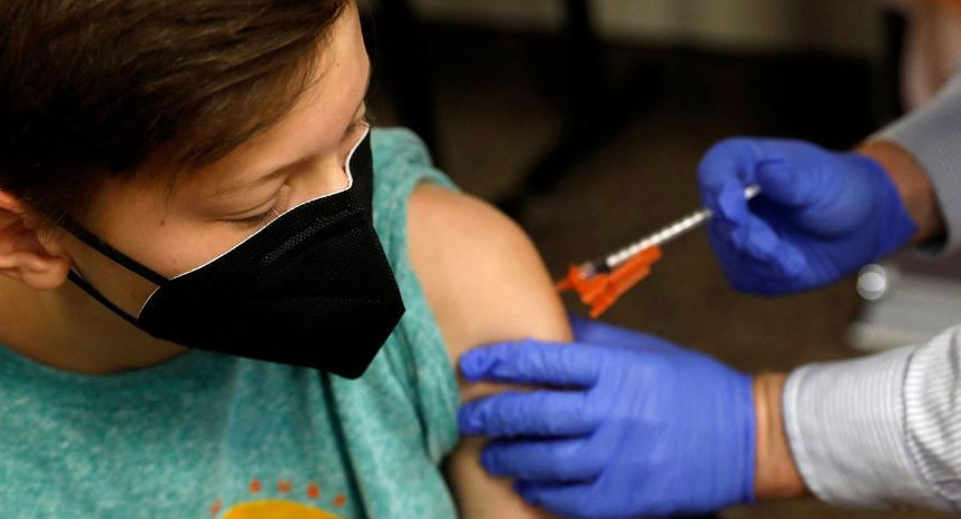 Vacunación menores, Reuters