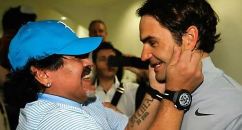 Roger Federer y Diego Maradona. Foto: NA.