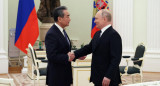 Vladimir Putin y Wang Yi, Reuters