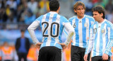 Gabriel Heinze y Lionel Messi. Foto: NA