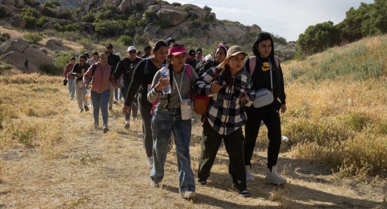 Migrantes en la frontera México-Estados Unidos. Foto: Reuters