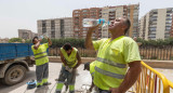 Trabajadores y el impacto del cambio climático. Foto: EFE