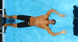 Natación - Final de 100 m espalda masculino - Thomas Ceccon de Italia en acción. REUTERS/Marko Djurica