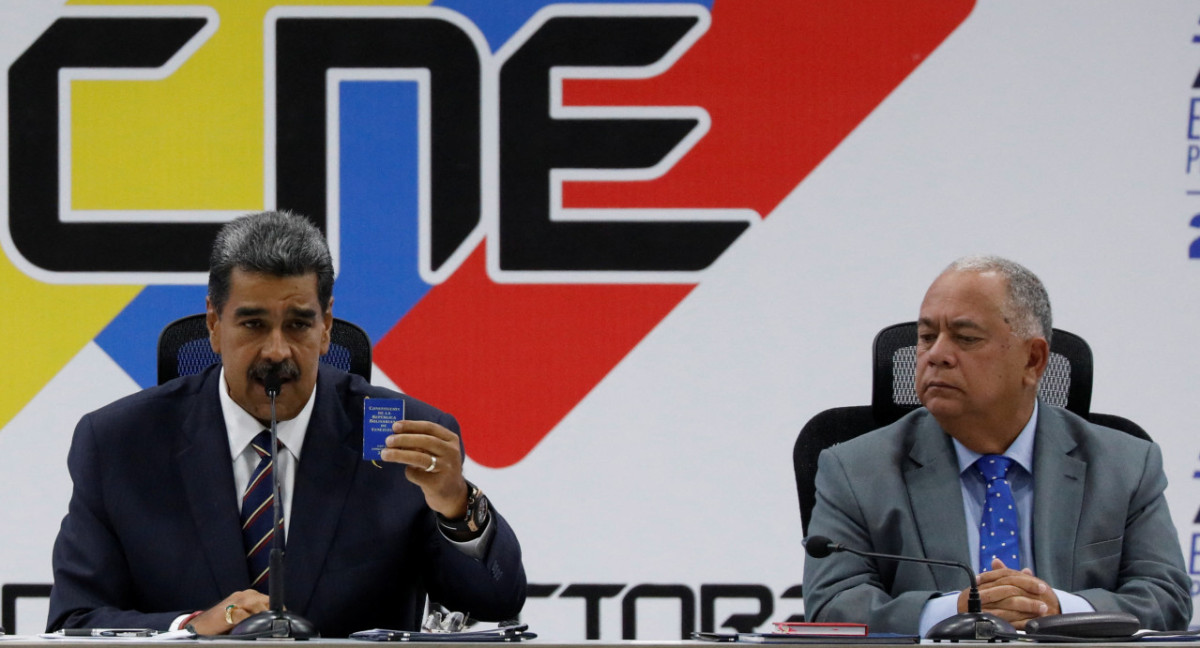 Nicolás Maduro y Elvis Amoroso, presidente del CNE de Venezuela. Foto: Reuters.