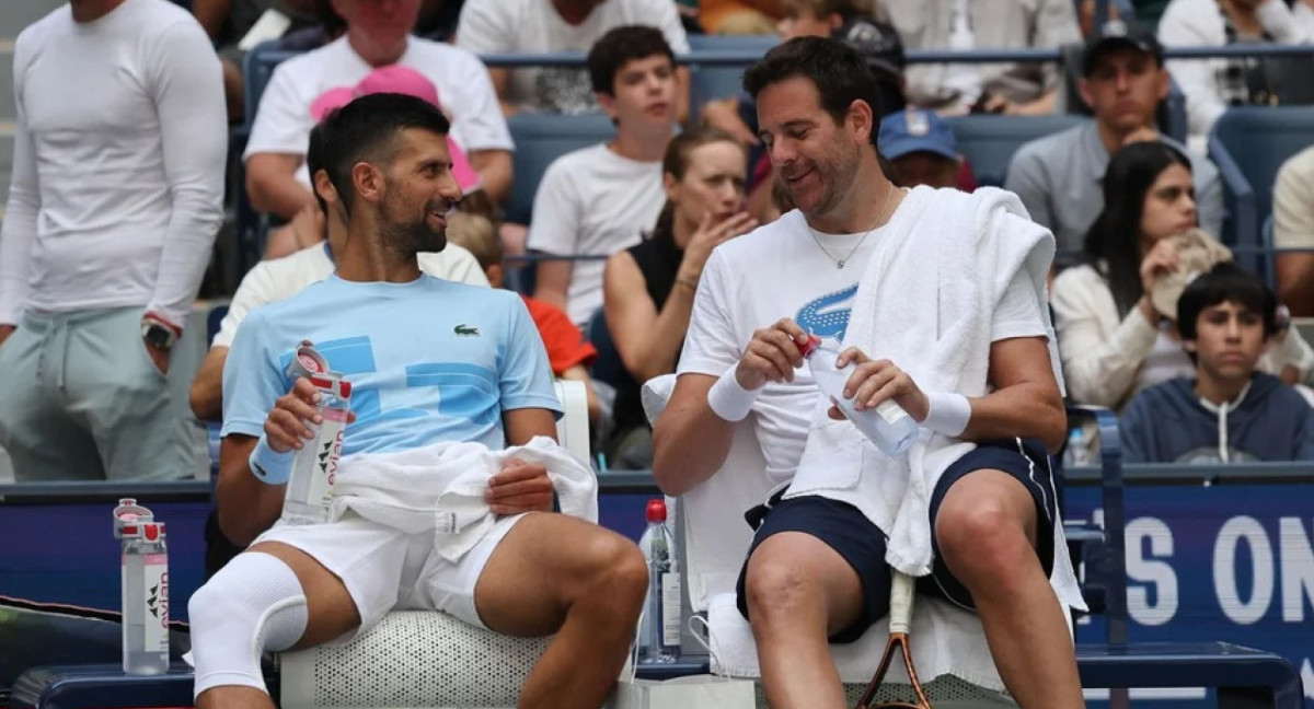 Novak Djokovic y Juan Martín Del Potro en el US Open. Foto. NA.