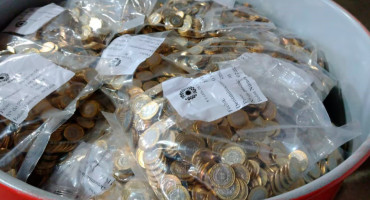 Subasta de monedas en tambores. Foto: Banco Ciudad.