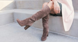 Botas, vestimenta, moda. Foto: Unsplash.