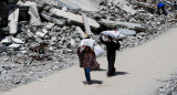Reparto de ayuda humanitaria en la Franja de Gaza. Foto: REUTERS/Mahmoud Issa.