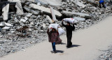 Reparto de ayuda humanitaria en la Franja de Gaza. Foto: REUTERS/Mahmoud Issa.