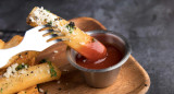 Papas con queso parmesano. Fuente: Pexels